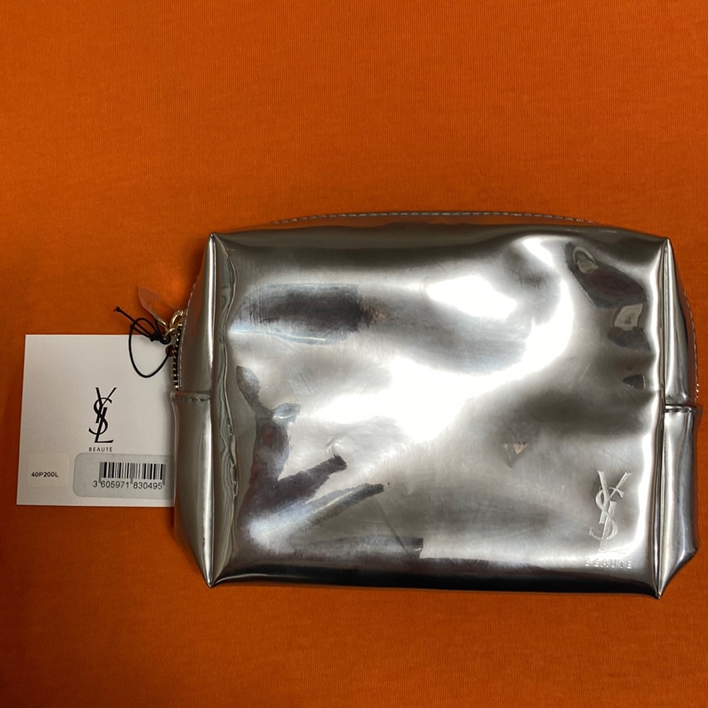 New Cosmetic Bag by Yves Saint Laurent Metallic color size 6”L 5”H 2”W